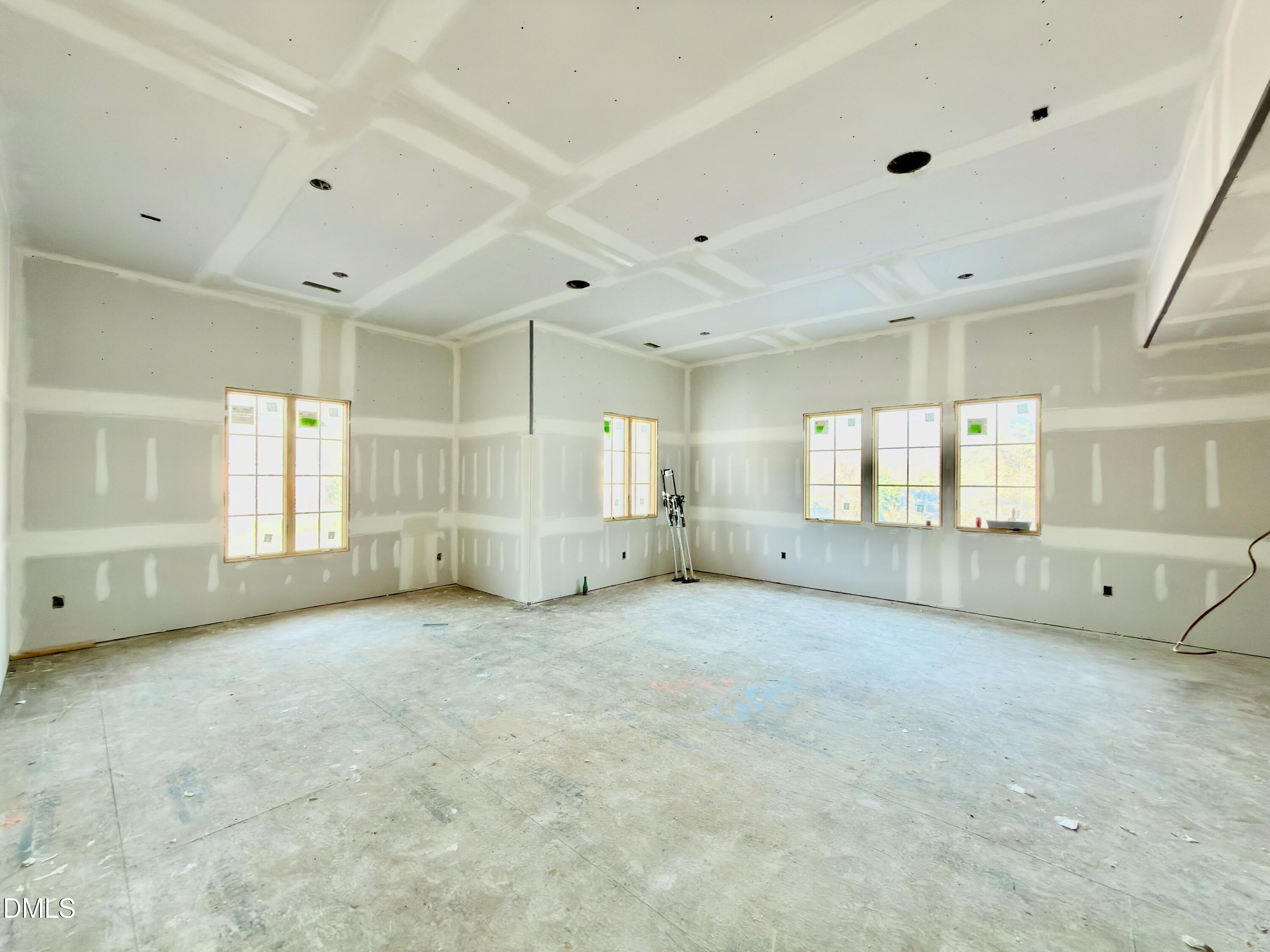 6832 Greystone Drive Raleigh, NC 27615 - Photo 37 of 51 a view of an empty room with a window