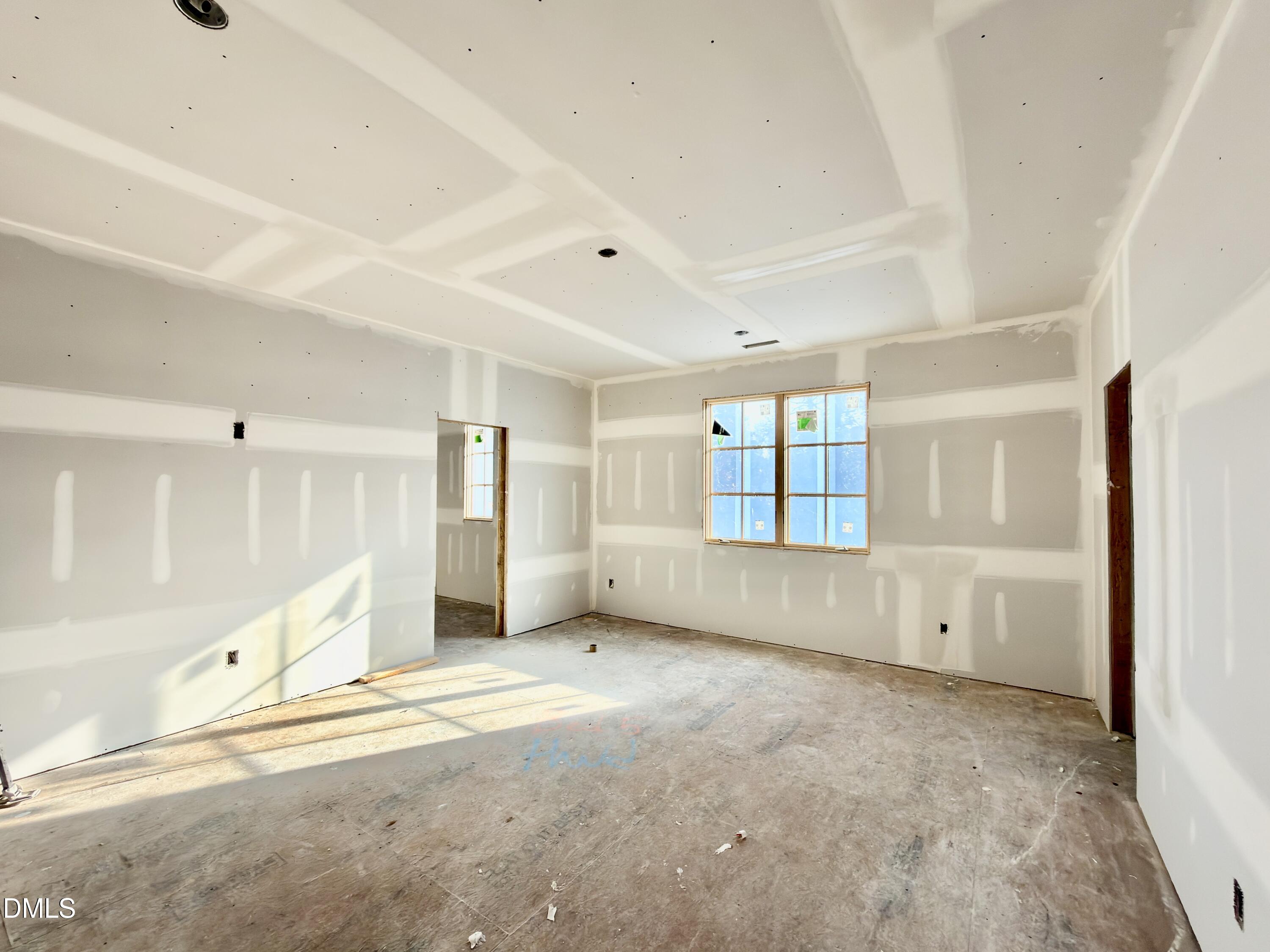 6832 Greystone Drive Raleigh, NC 27615 - Photo 46 of 51 a view of an empty room with a window