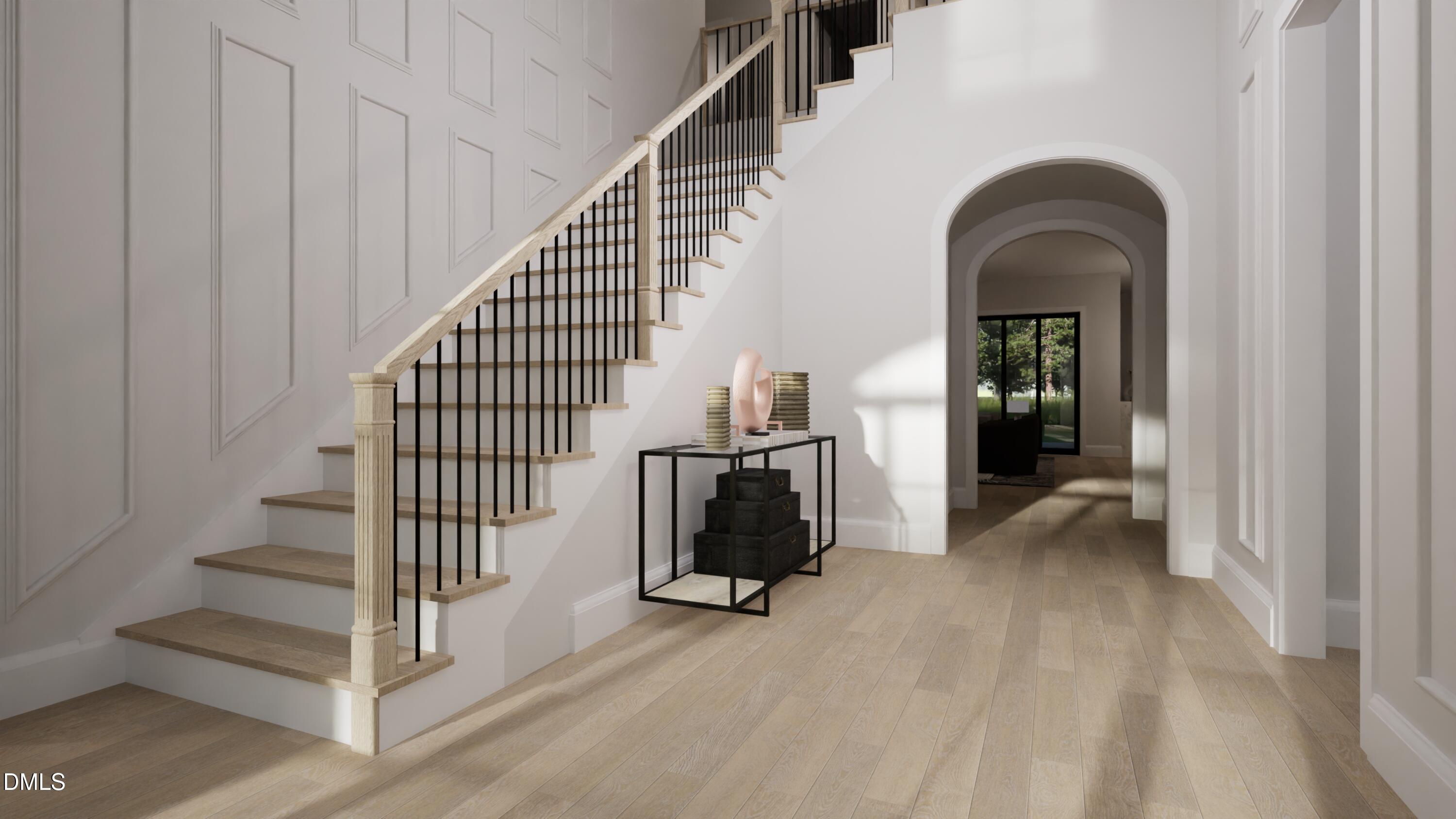 6832 Greystone Drive Raleigh, NC 27615 - Photo 6 of 51 a view of entryway and hall with wooden floor