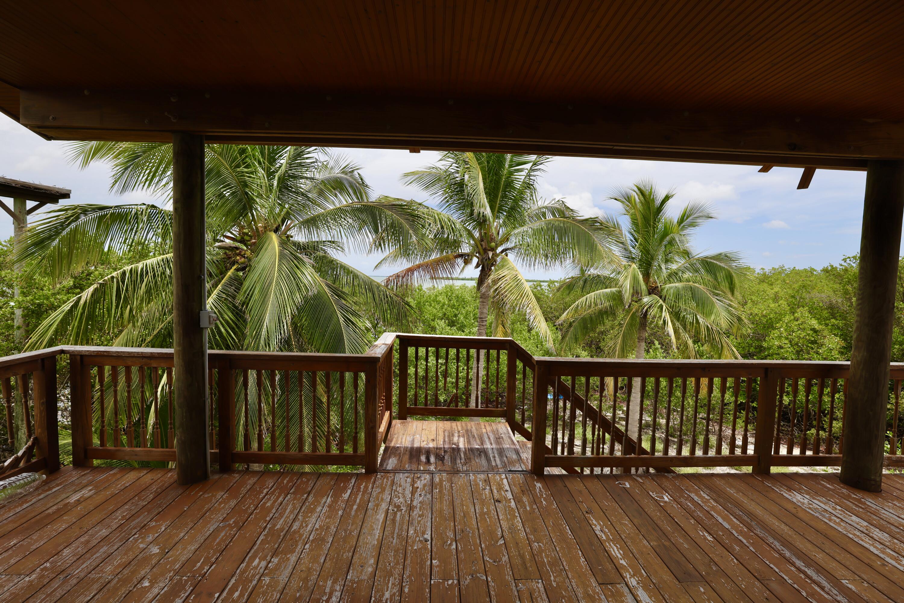 0 Melody Summerland Key, FL 33042 - Photo 42 of 45 a view of a balcony with wooden floor