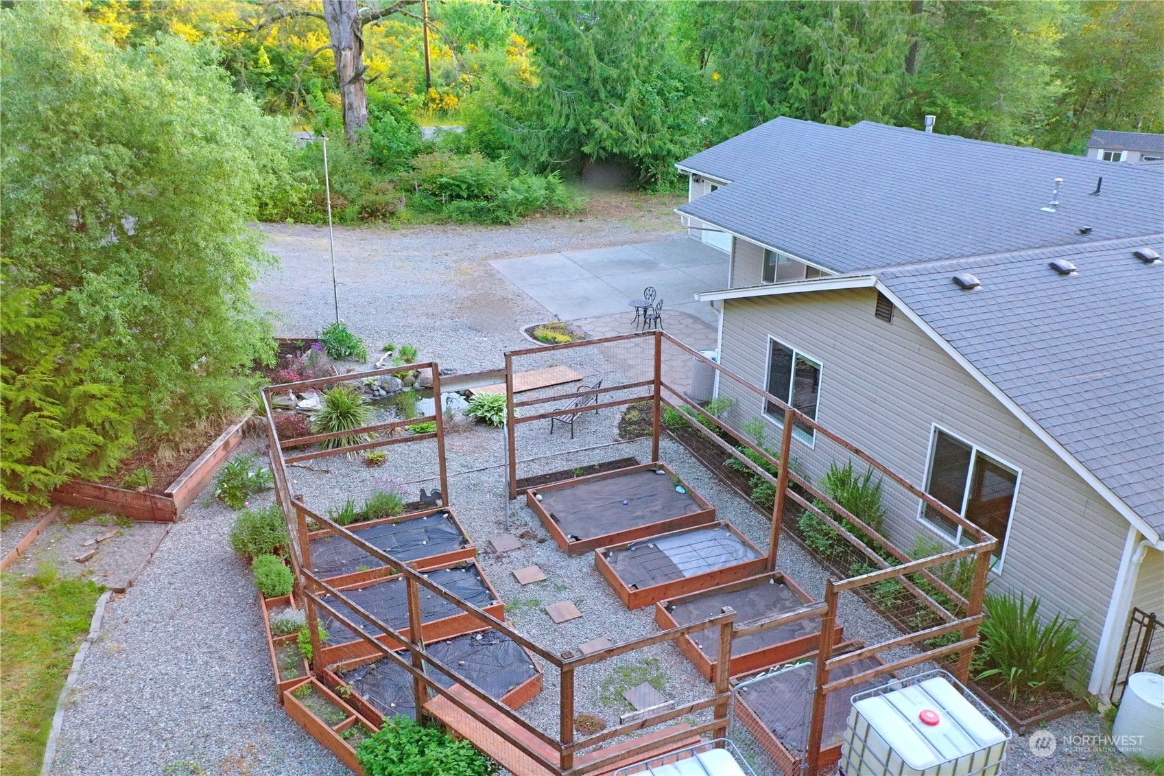 8307 Waddell Creek Road Southwest Olympia, WA 98512 - Photo 21 of 33 an aerial view of a house with a yard