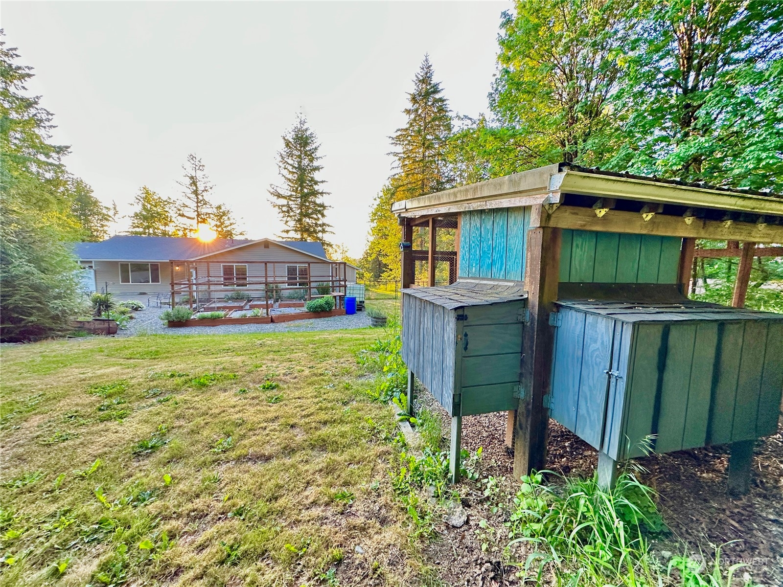 8307 Waddell Creek Road Southwest Olympia, WA 98512 - Photo 27 of 33 a view of a house with a yard