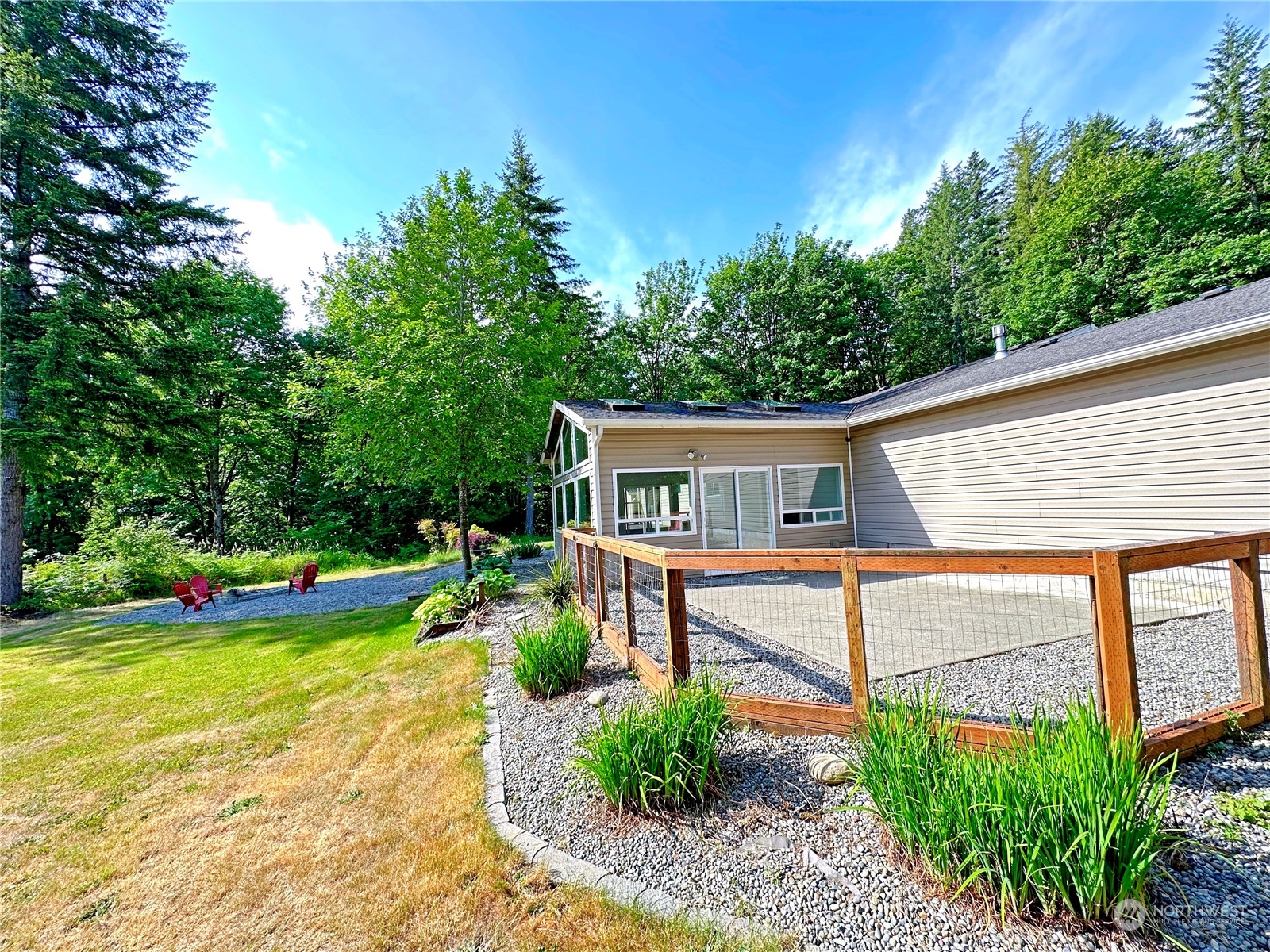 8307 Waddell Creek Road Southwest Olympia, WA 98512 - Photo 29 of 33 a front view of house with yard and green space