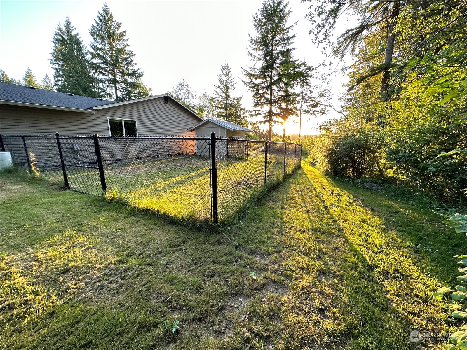 8307 Waddell Creek Road Southwest Olympia, WA 98512 - Photo 32 of 33 a view of a house with swimming pool