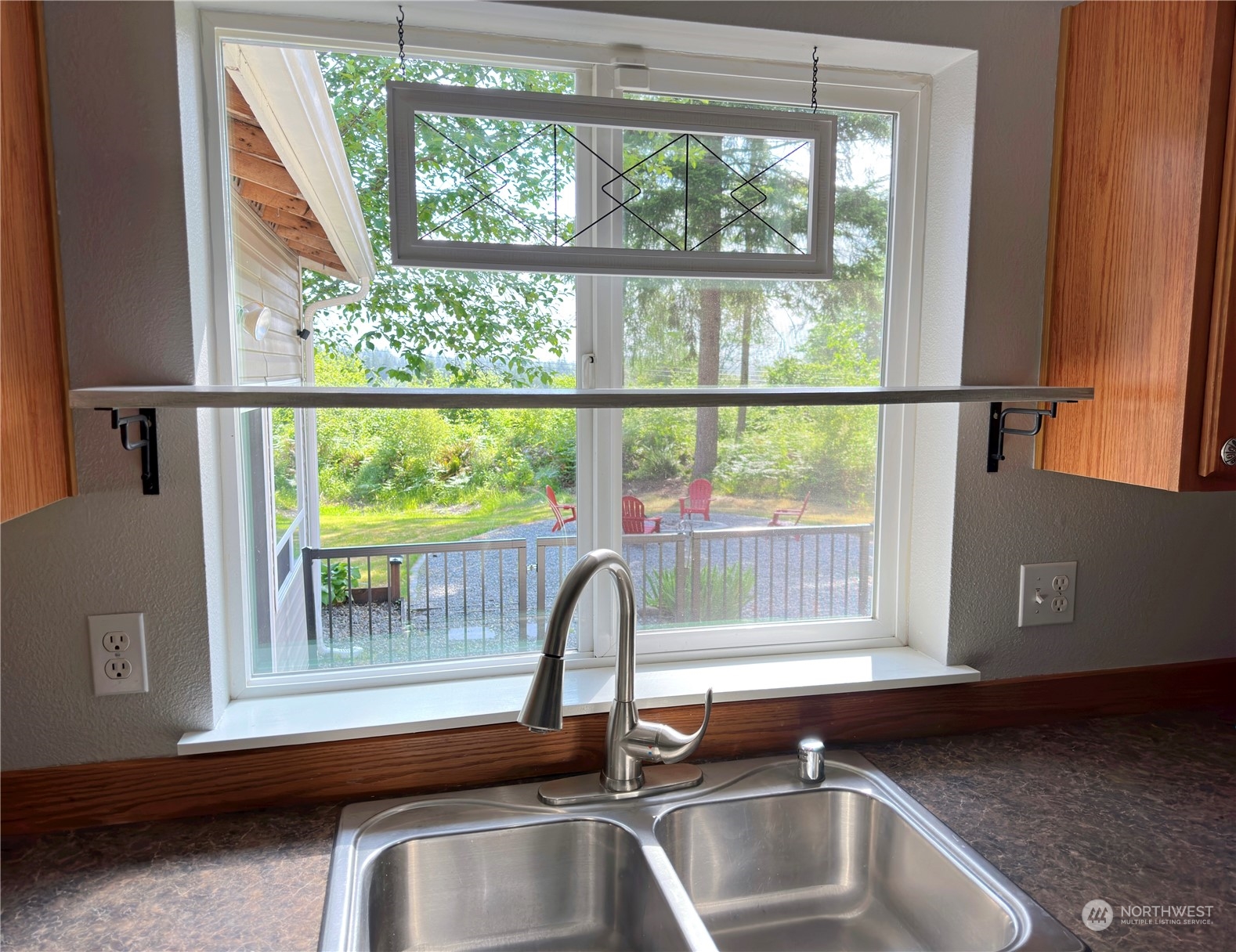 8307 Waddell Creek Road Southwest Olympia, WA 98512 - Photo 10 of 33 a kitchen with a sink and a window
