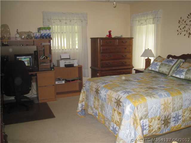 1764 Southwest Gregor Way Stuart, FL 34997 - Photo 6 of 12 Master Bedroom.