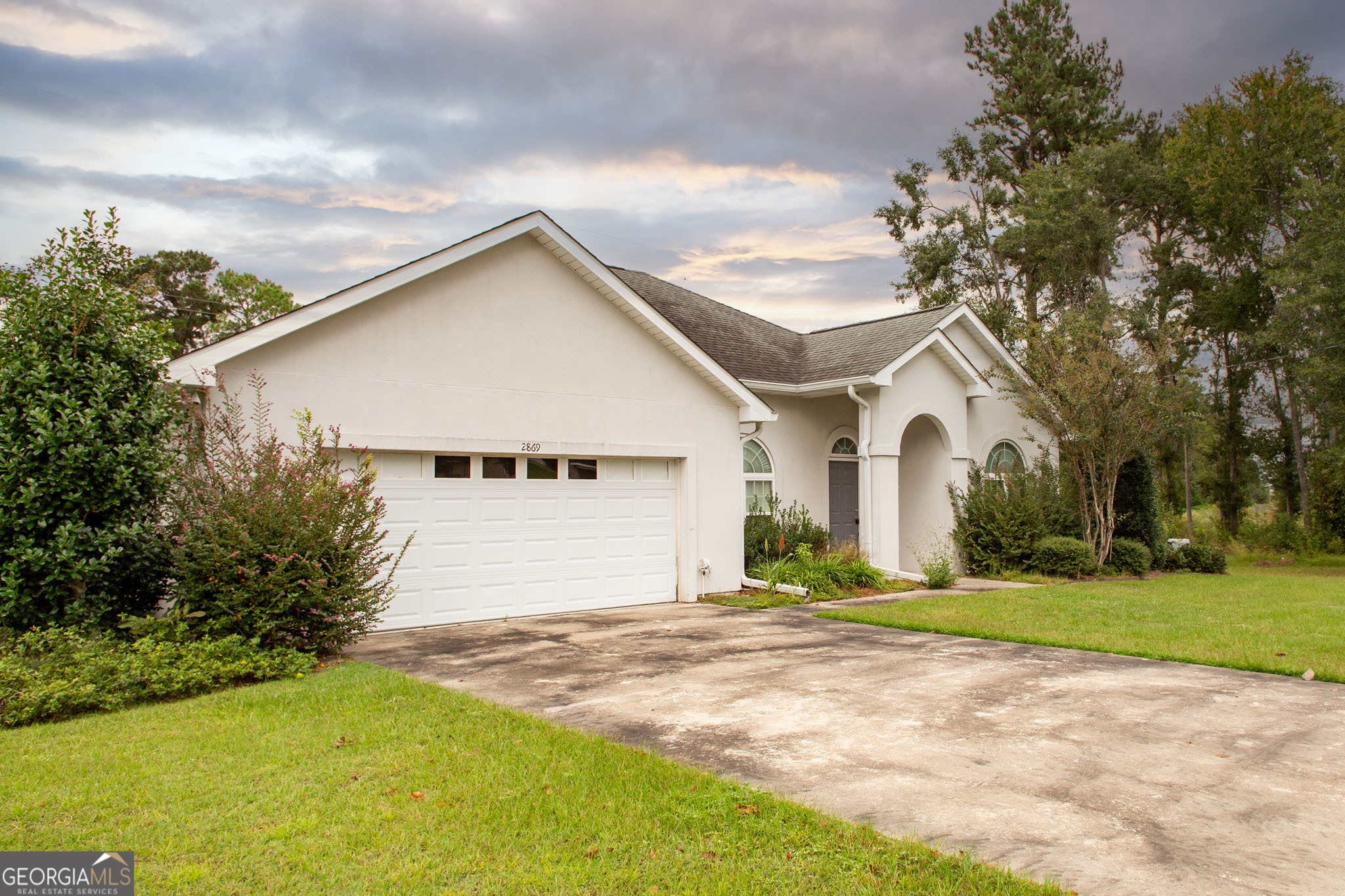 2869 Ben Street Waycross, GA 31503 - Photo 2 of 37 a view of backyard of house with garage
