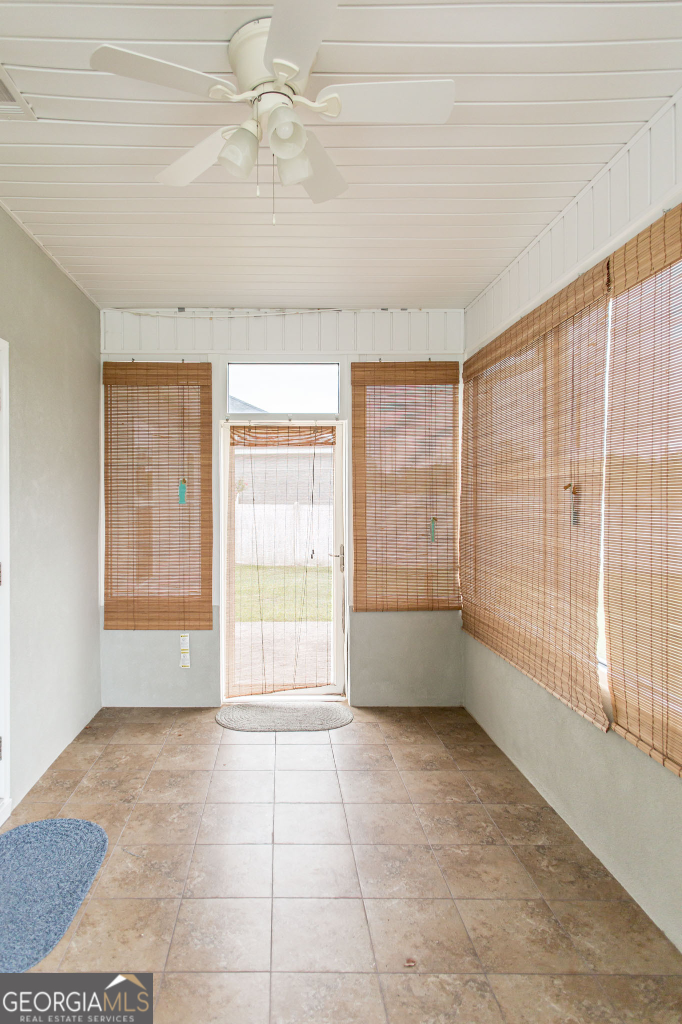2869 Ben Street Waycross, GA 31503 - Photo 32 of 37 a view of an empty room with a window