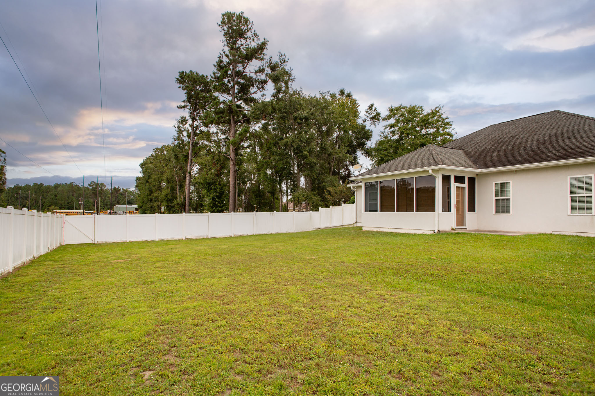 2869 Ben Street Waycross, GA 31503 - Photo 36 of 37 a view of a house with a yard