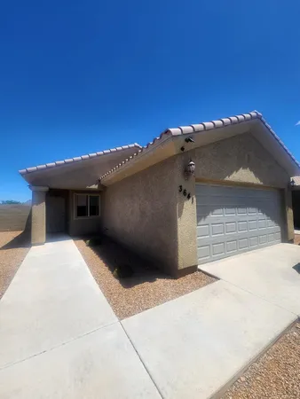 a view of a house with a garage
