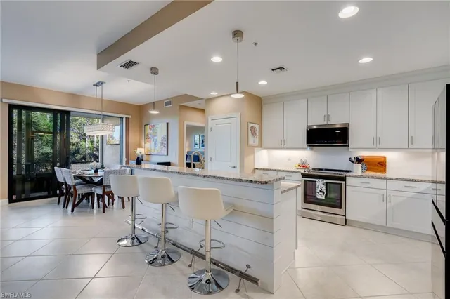 $535,000 | 15184 Butler Lake Drive, Unit 101, Naples, FL 34109