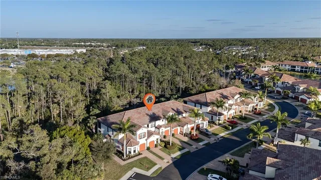 $535,000 | 15184 Butler Lake Drive, Unit 101, Naples, FL 34109