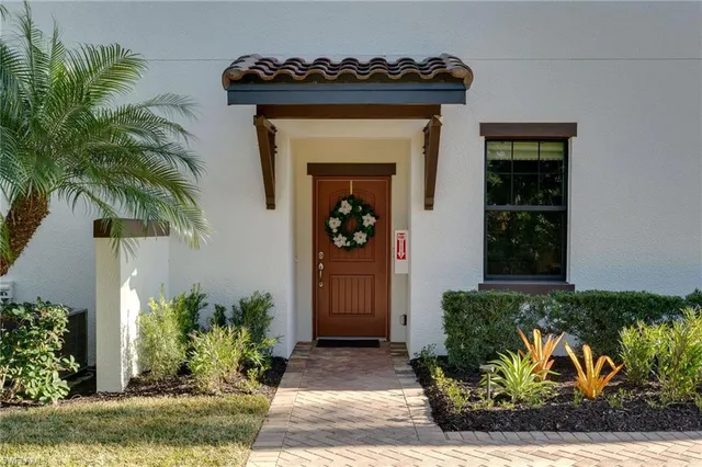 $535,000 | 15184 Butler Lake Drive, Unit 101, Naples, FL 34109