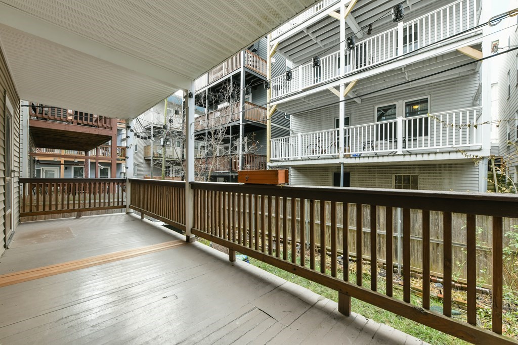 a view of a balcony with a porch