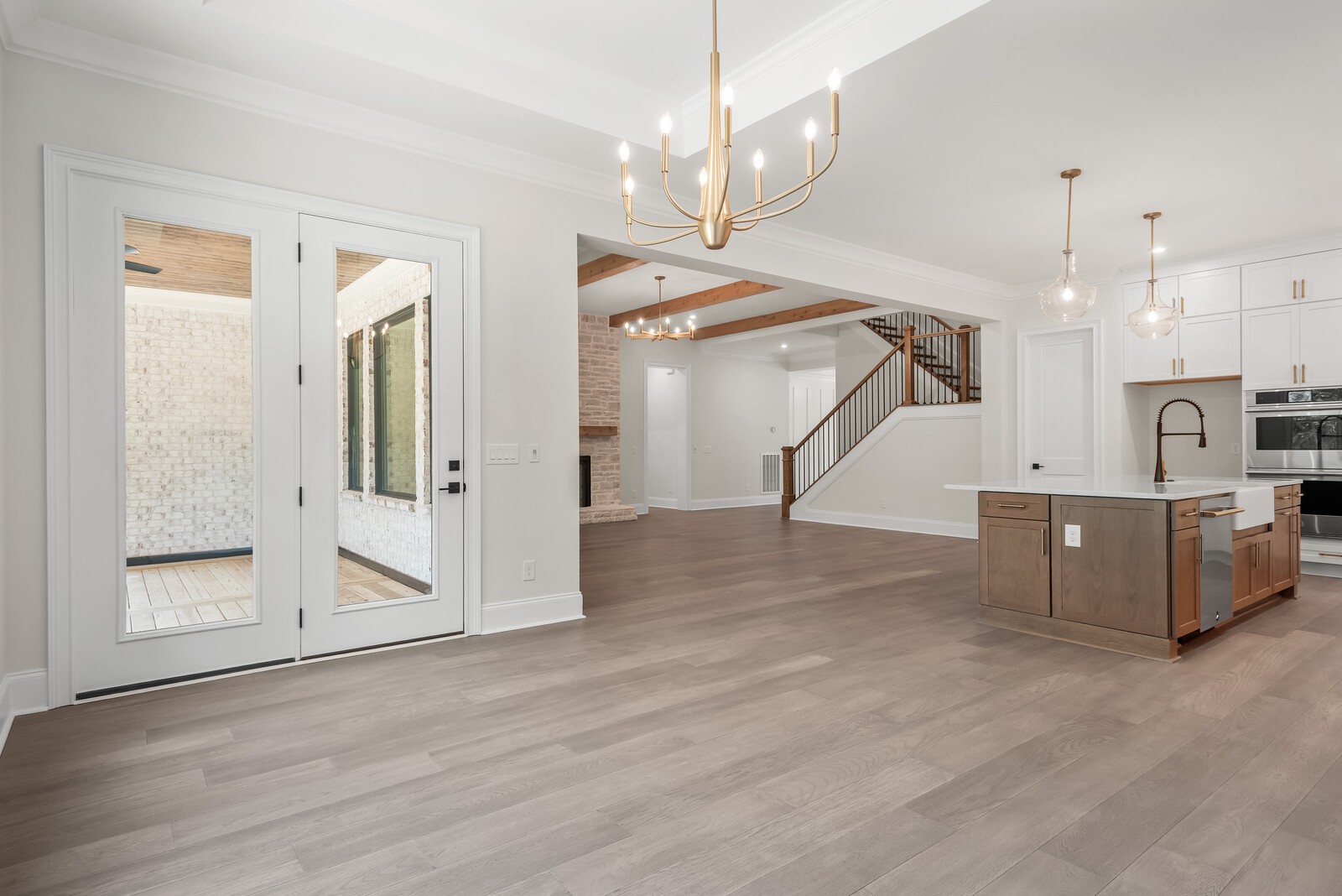 0 Bethesda-Arno Road Thompson's Station, TN 37179 - Photo 31 of 78 a view of a livingroom with wooden floor and a ceiling fan