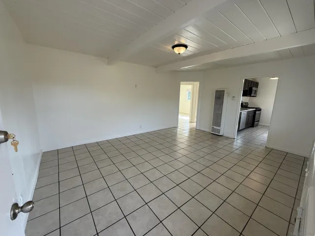 a view of a livingroom and window