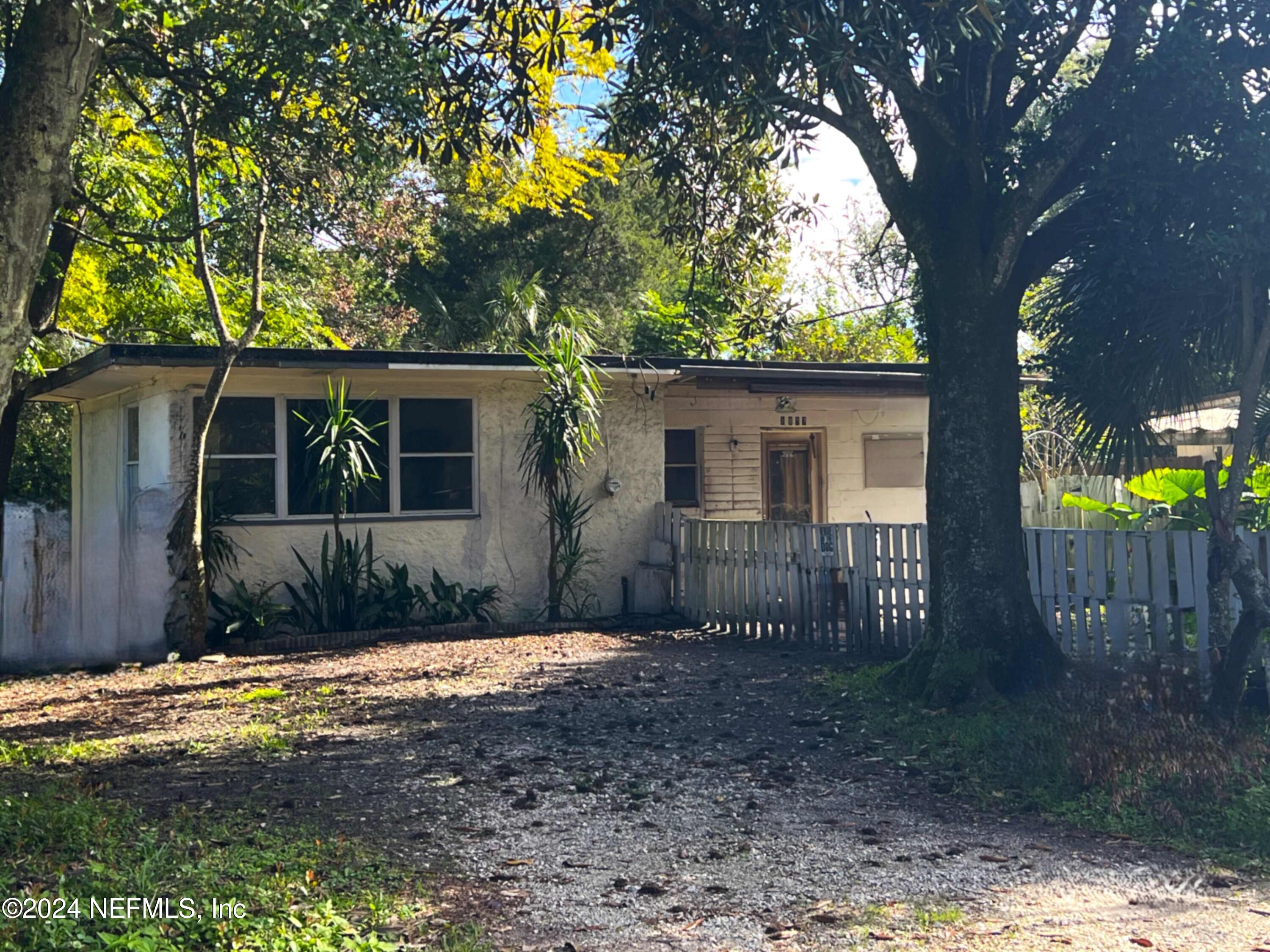 1857 Brookview Drive South Jacksonville, FL 32246 - Photo 1 of 12 a view of a house with a yard