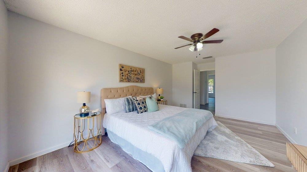 10 Coral Reef Court Palm Coast, FL 32137 - Photo 15 of 44 a bedroom with a bed and a table