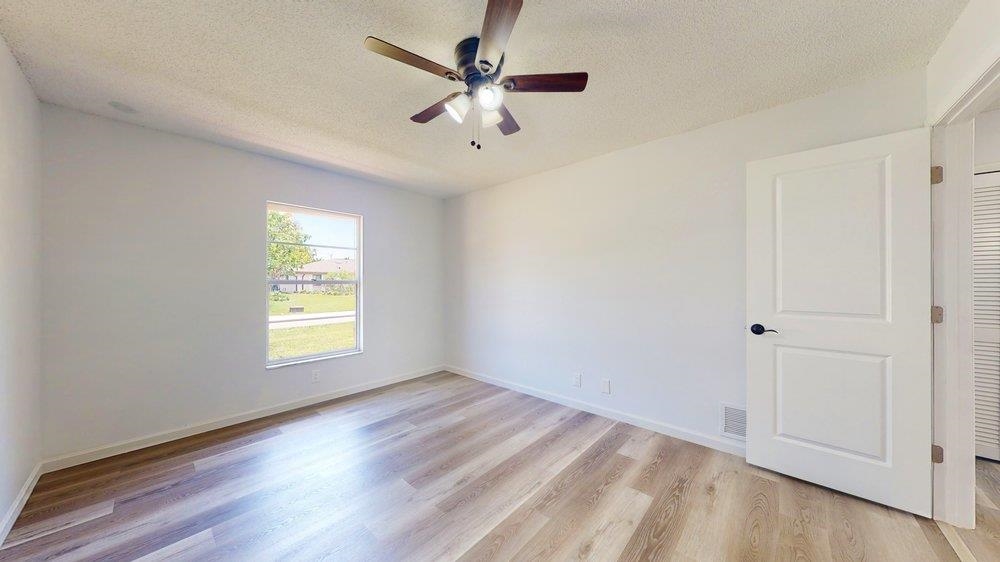 10 Coral Reef Court Palm Coast, FL 32137 - Photo 26 of 44 a view of an empty room with a window