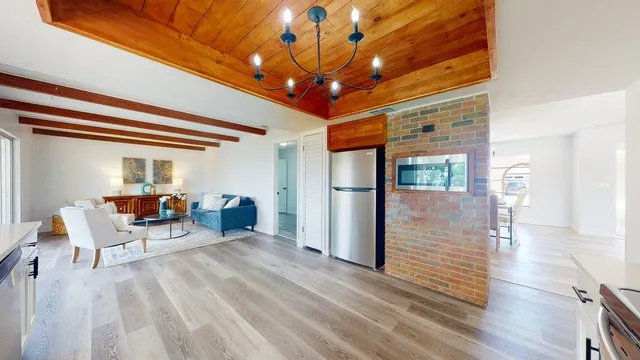a view of a kitchen with a sink