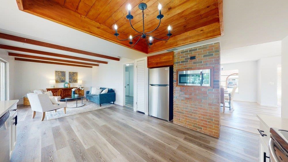 10 Coral Reef Court Palm Coast, FL 32137 - Photo 32 of 44 a view of livingroom with furniture and wooden floor