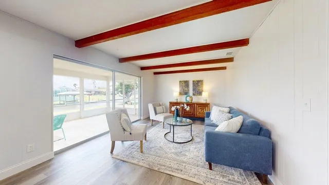 a view of livingroom with furniture and wooden floor
