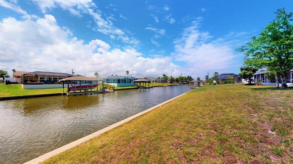 10 Coral Reef Court Palm Coast, FL 32137 - Photo 42 of 44 a view of a lake with houses