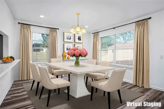 a view of a dining room with furniture window and outside view