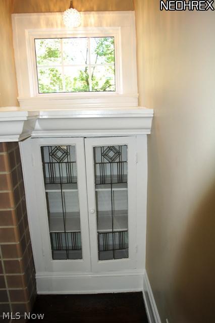 3125 Yorkshire Road Cleveland, OH 44118 - Photo 10 of 22 Leaded glass built-in flanking the fireplace