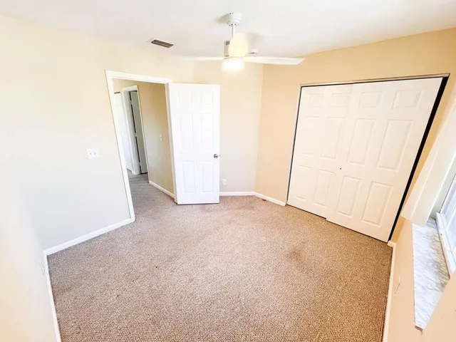a kitchen with stainless steel appliances a refrigerator sink and microwave