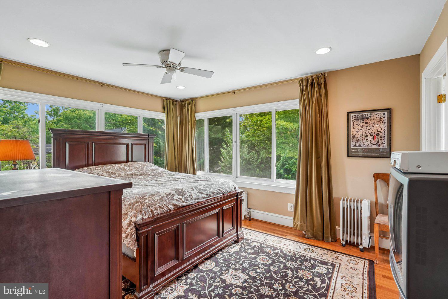 16 Maple Avenue Washington Grove, MD 20880 - Photo 29 of 58 Bright and airy bedroom with scenic views.