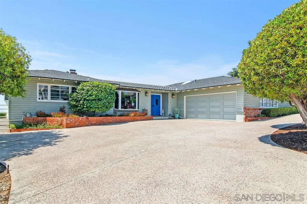 1112 La Jolla Rancho Road La Jolla, CA 92037 - Photo 3 of 25 front view of a house with a street