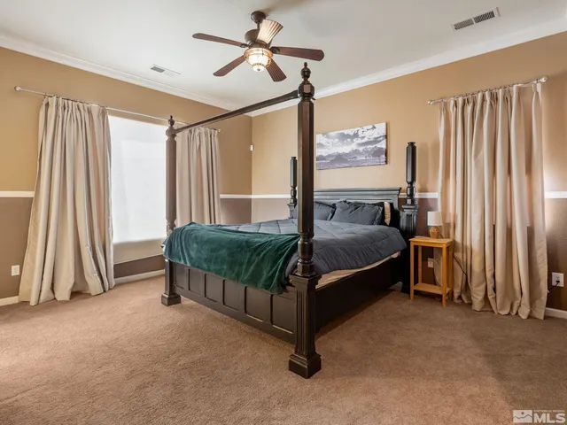 a bathroom with a granite countertop tub sink and mirror