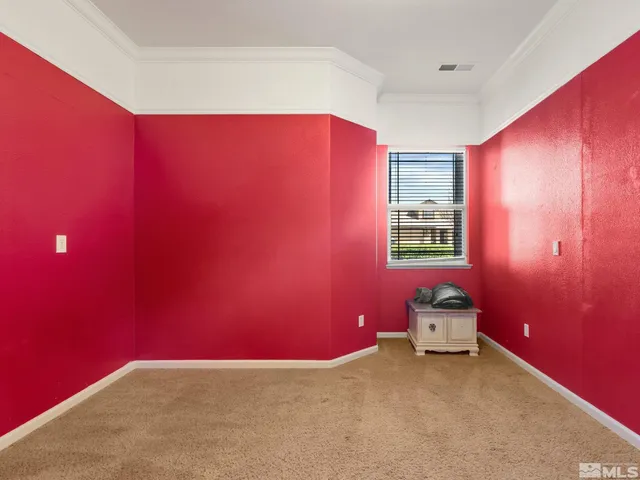 a view of a livingroom with furniture and cabinet