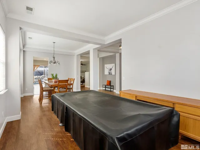 a kitchen with stainless steel appliances a stove and cabinets