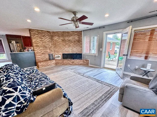 a bedroom with a bed and a mirror