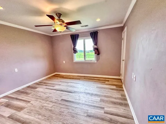 a view of a garden and deck