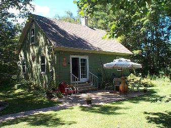 149 Pixley Road Monterey, MA 01230 - Photo 2 of 2 a view of a house with backyard