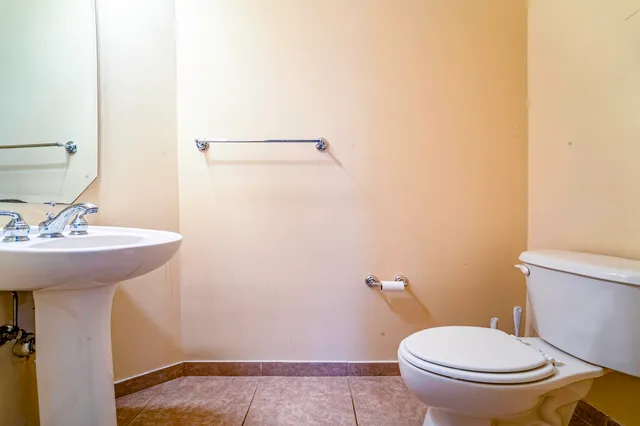 a bathroom with a sink and a toilet