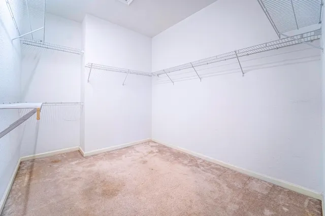 a view of a room with racks on the wall