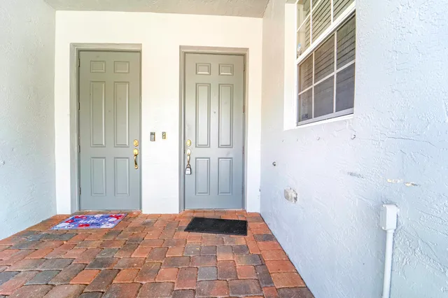 a view of a hallway with a bedroom
