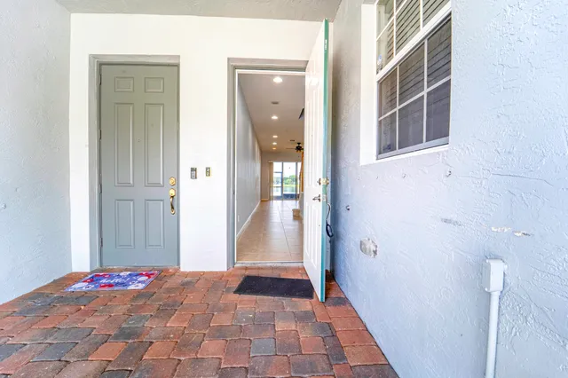 a view of entryway with wooden floor