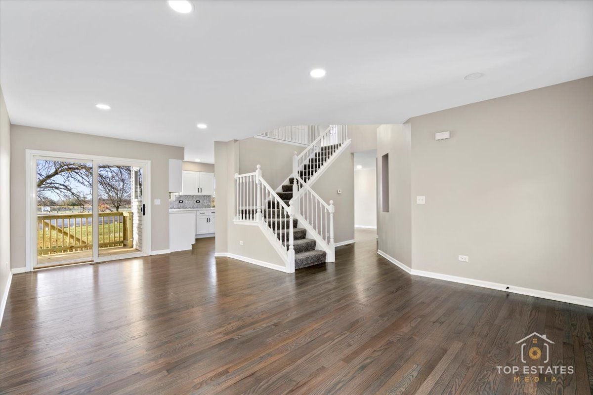 737 Springwood Drive Joliet, IL 60431 - Photo 5 of 31 a view of an entryway with wooden floor