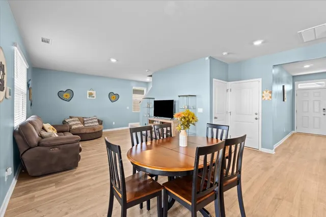 a view of a dining room with furniture
