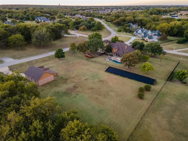 an aerial view of residential house with outdoor space