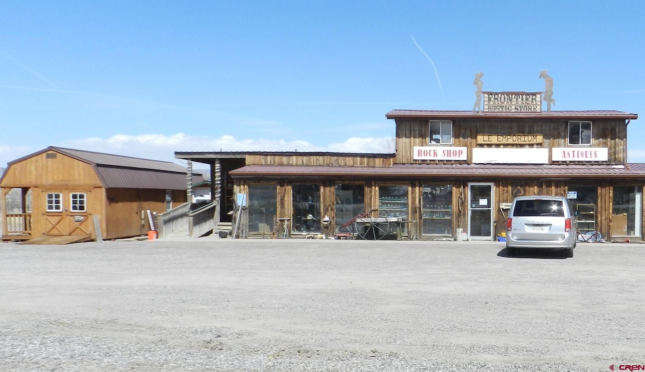 a view of a car park in front of garage