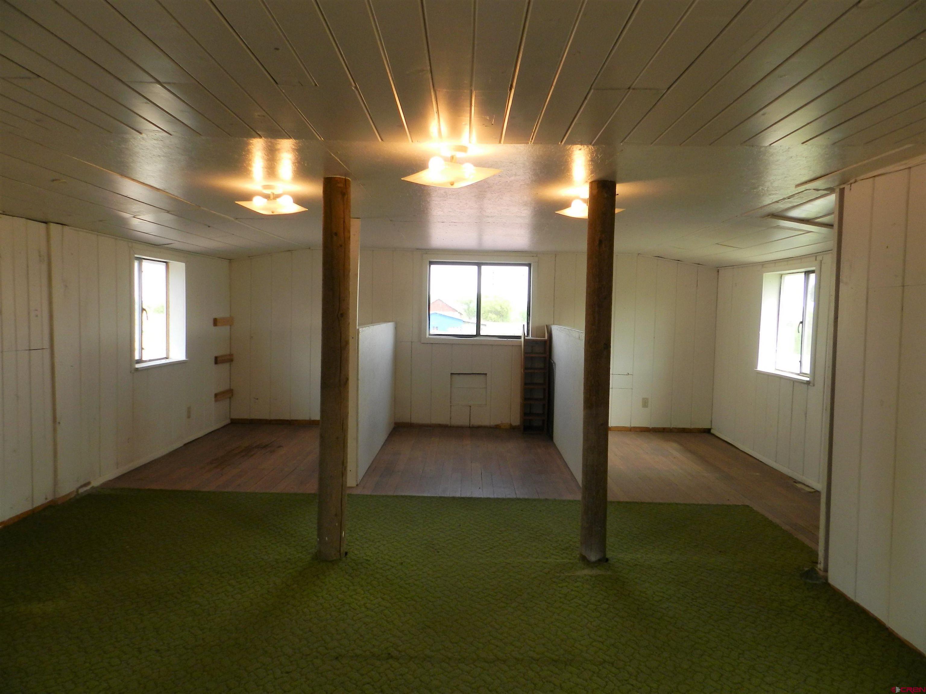 17656 Highway 550, Unit I1 Montrose, CO 81403 - Photo 16 of 18 a view of livingroom with window