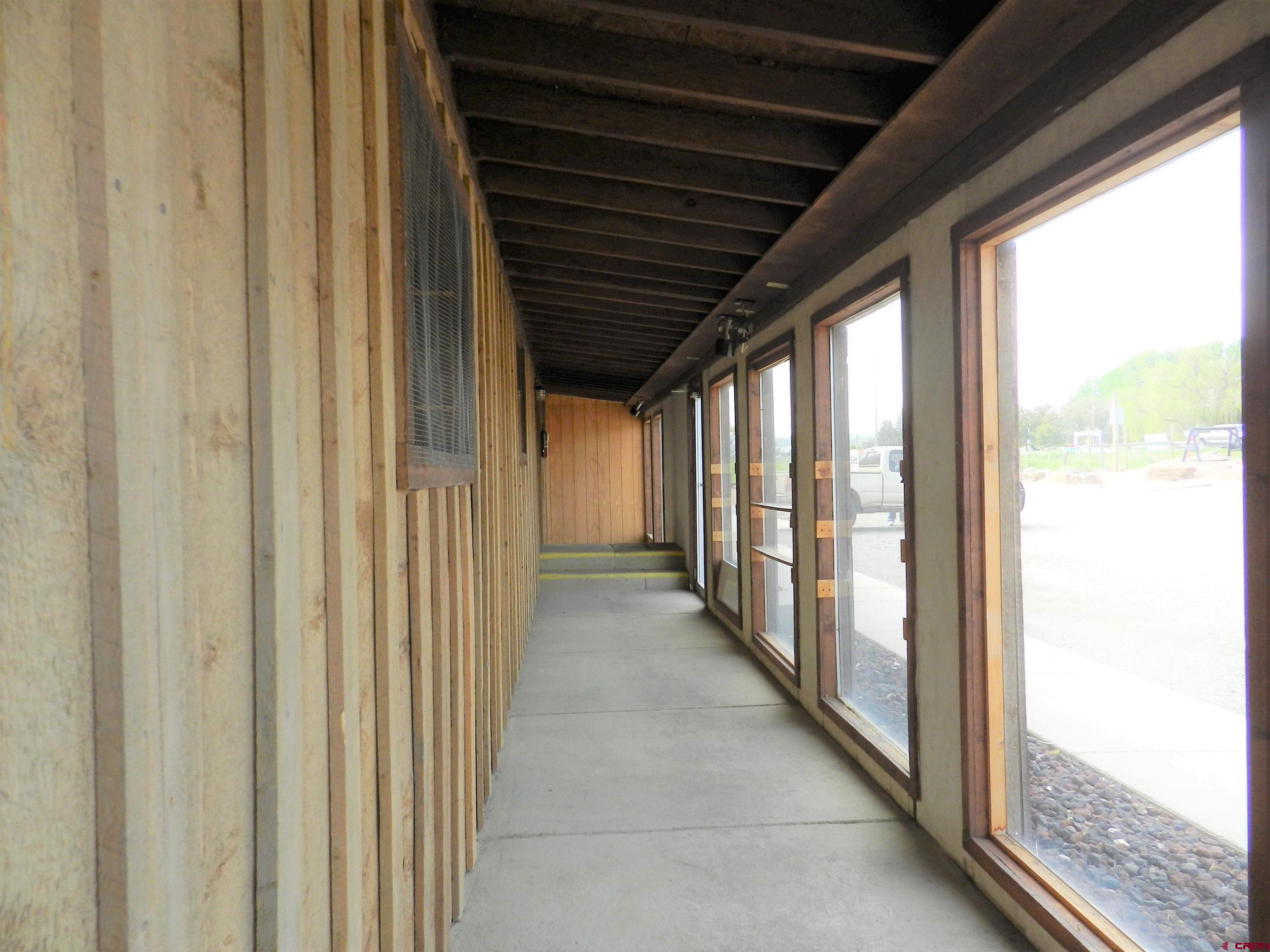 17656 Highway 550, Unit I1 Montrose, CO 81403 - Photo 6 of 18 a view of hallway with stairs