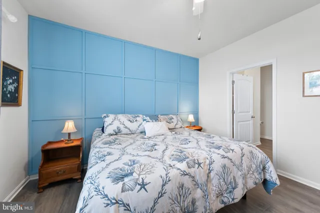 a bedroom with a bed and a closet