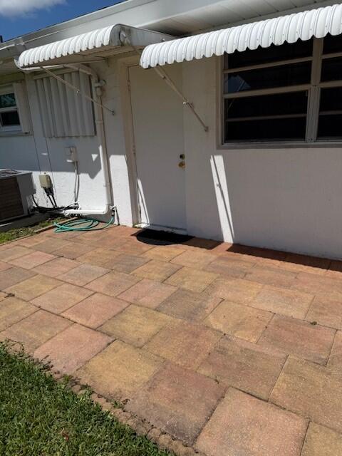 322 Colony Lane, Unit C Fort Pierce, FL 34982 - Photo 18 of 25 Paver patio